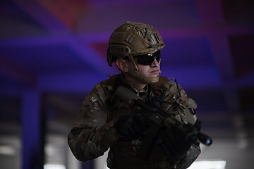 Image showing modern warfare soldier in urban environment battlefield