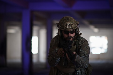 Image showing modern warfare soldier in urban environment battlefield