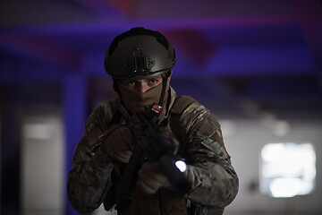 Image showing modern warfare soldier in urban environment battlefield