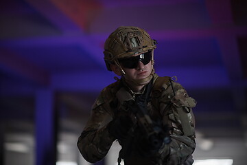 Image showing modern warfare soldier in urban environment battlefield