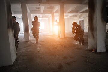 Image showing military troops in action urban environment