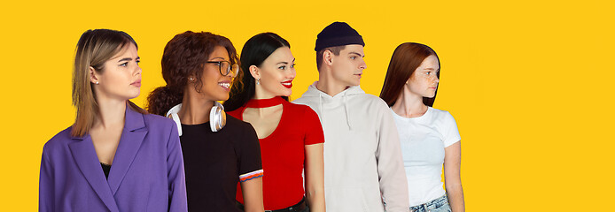 Image showing Portrait of young people on bright yellow studio background, collage