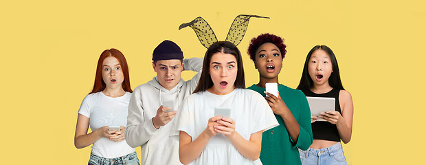 Image showing Portrait of young people on bright yellow studio background, collage