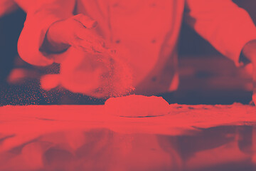 Image showing chef hands preparing dough for pizza