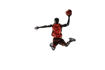 Image showing Full length portrait of a basketball player with ball