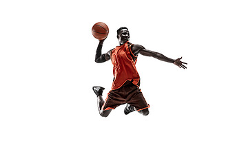 Image showing Full length portrait of a basketball player with ball