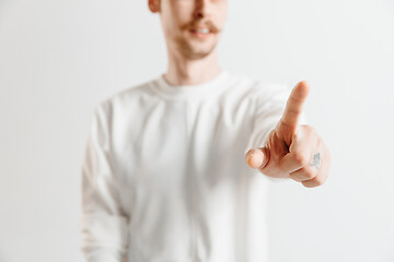 Image showing Businessman hand touching empty virtual screen