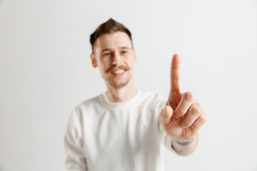 Image showing Businessman hand touching empty virtual screen