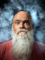 Image showing bearded man smoke portrait