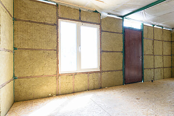 Image showing Fragment of the wall of the interior of a country house, the wall is thermally insulated with mineral plates