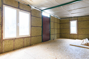 Image showing Fragment of the wall of the interior of a country house, the wall is thermally insulated with mineral plates