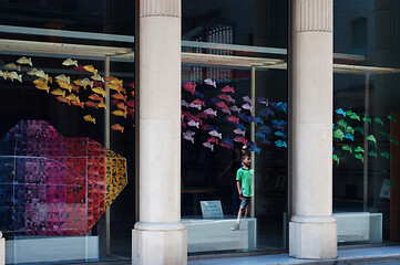 Image showing BARCELONA, SPAIN - JUNE 2, 2013: Contemporary gallery showcase with rainbow fish