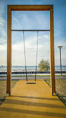 Image showing Big swing with view to the sea