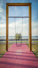 Image showing Big swing with view to the sea