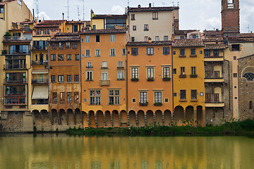 Image showing FLORNCE, ITALY - APRIL 24, 2019: View of the historic buildings in Florence. Reflection in the river