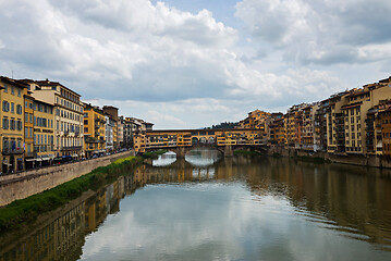 Image showing FLORNCE, ITALY - APRIL 24, 2019: Ponte Vecchio. View of the historic buildings in Florence. Reflection in the river