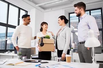 Image showing new female employee meeting colleagues at office