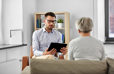 Image showing psychologist with tablet pc and senior patient