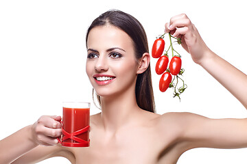 Image showing girl with cherry tomatoes and juice 