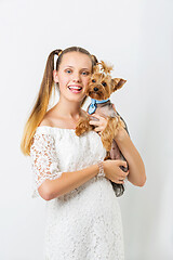 Image showing Girl with yorkie dog