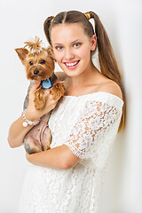 Image showing Girl with yorkie dog