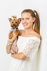 Image showing Girl with yorkie dog