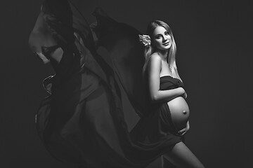 Image showing Pregnant girl in red dress