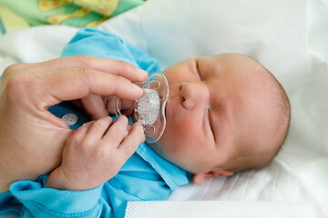 Image showing Newborn baby infant in the hospital