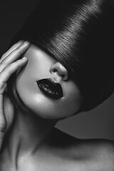 Image showing beautiful girl with black lips