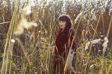 Image showing Beautiful girl outdoors in countryside