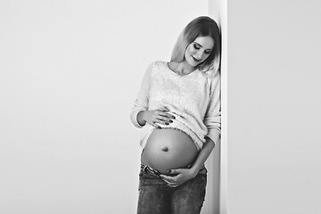 Image showing Beautiful pregnant woman in jeans