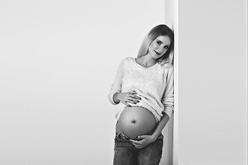 Image showing Beautiful pregnant woman in jeans