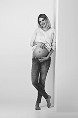 Image showing Beautiful pregnant woman in jeans