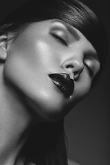 Image showing beautiful girl with black lips