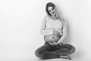 Image showing Beautiful pregnant woman in jeans
