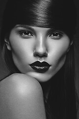 Image showing beautiful girl with black lips