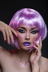 Image showing Beautiful girl in purple wig