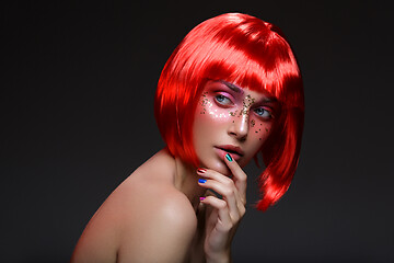 Image showing Beautiful girl in red wig