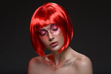 Image showing Beautiful girl in red wig