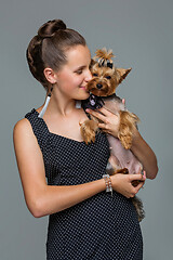 Image showing Girl with yorkie dog