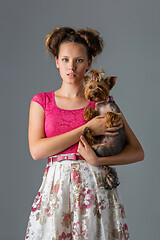 Image showing Girl with yorkie dog