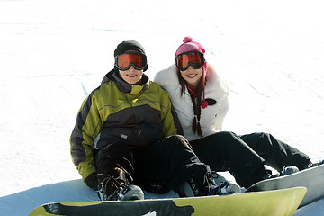 Image showing Couple teen snowboarders