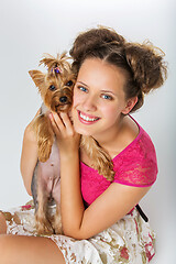 Image showing Girl with yorkie dog