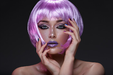 Image showing Beautiful girl in purple wig