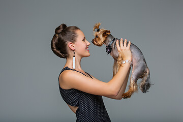 Image showing Girl with yorkie dog