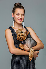 Image showing Girl with yorkie dog