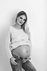 Image showing Beautiful pregnant woman in jeans