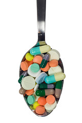 Image showing Spoonful of pills
