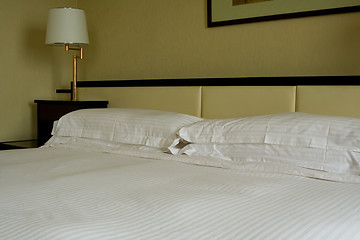 Image showing King sized bed in a hotel suite room