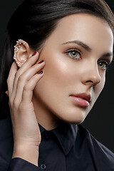 Image showing Beautiful girl with pearls on ear